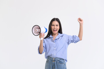 Young Woman Enthusiastically Engages With a Megaphone in a Bright Studio Setting