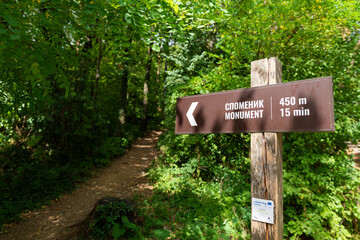 Direction sign to monument on Banj hill near Banja luka close up with distance and walk time
