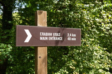 Direction sign to main entrance on Banj hill near Banja luka close up with distance and walk time