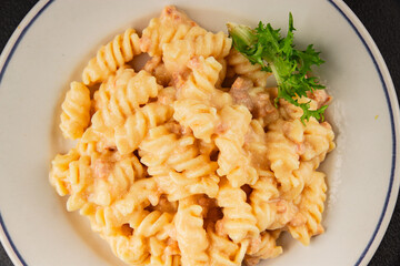 Carbonara pasta fusilli creamy sauce main course Italian cuisine tasty snack fresh delicious gourmet food background on table rustic food top view copy space