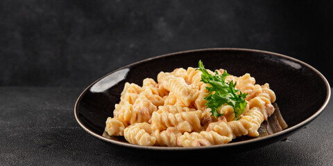 Carbonara pasta fusilli creamy sauce main course Italian cuisine tasty snack fresh delicious gourmet food background on table rustic food top view copy space