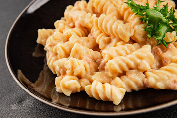 Carbonara pasta fusilli creamy sauce main course Italian cuisine tasty snack fresh delicious gourmet food background on table rustic food top view copy space