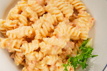 Carbonara pasta fusilli creamy sauce main course Italian cuisine tasty snack fresh delicious gourmet food background on table rustic food top view copy space