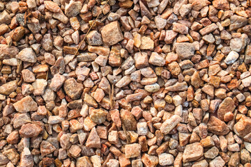 Crushed stone texture background. Seamless rock stones. 