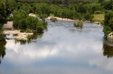 View from the famous, historic Pont du Gard aqueduct into the Gardon River, Gard department, Provence, France
