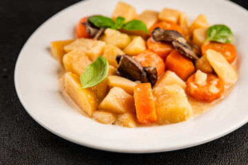 Potato stew mushrooms and vegetables natural tasty snack fresh delicious gourmet food background on the table rustic top view copy space keto and paleo diet vegerian and vegan food