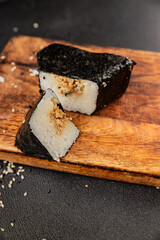 Onigiri sushi tuna stuffing Japanese food natural tasty snack fresh delicious gourmet food background on the table rustic top view copy space