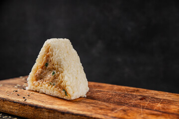 Onigiri sushi tuna stuffing Japanese food natural tasty snack fresh delicious gourmet food background on the table rustic top view copy space