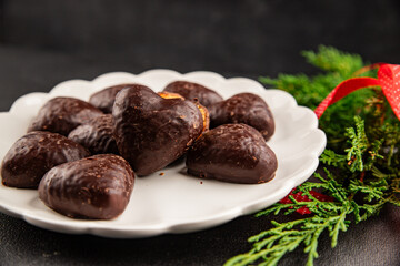Gingerbread chocolate heart shaped honey cakes Christmas sweet dessert new year natural product tasty snack fresh delicious gourmet food background on the table rustic top view copy space
