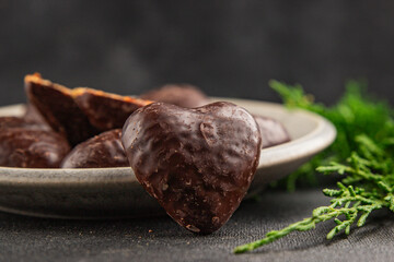 Gingerbread chocolate heart shaped honey cakes Christmas sweet dessert new year natural product tasty snack fresh delicious gourmet food background on the table rustic top view copy space