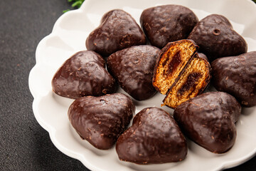 Gingerbread chocolate heart shaped honey cakes Christmas sweet dessert new year natural product tasty snack fresh delicious gourmet food background on the table rustic top view copy space