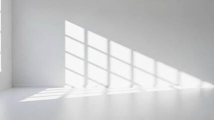 Minimalist empty room interior with bright sunlight casting geometric window shadow patterns across the clean white wall and floor, creating a modern abstract architectural background