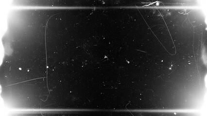 Abstract black and white film grain texture overlay with light leak effect, dust, scratches, and vintage grunge border for cinematic overlay or background design element