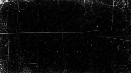 Abstract black background texture overlay with vintage film grain, scratches, dust, and light leak effects for grunge or retro design projects, perfect for adding aged cinematic look