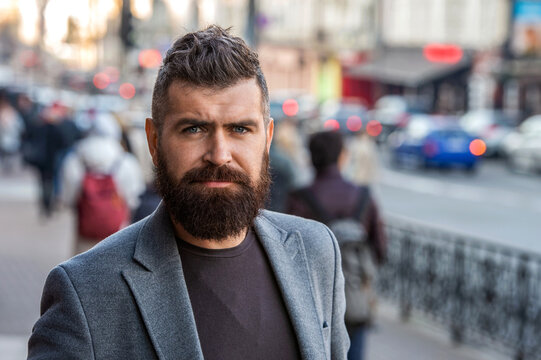 Businessman business style on street. Business man in urban city. Stylish businessman crossing street, lifestyle. Urban style. City street and stylish man. Bearded man in city street, banner