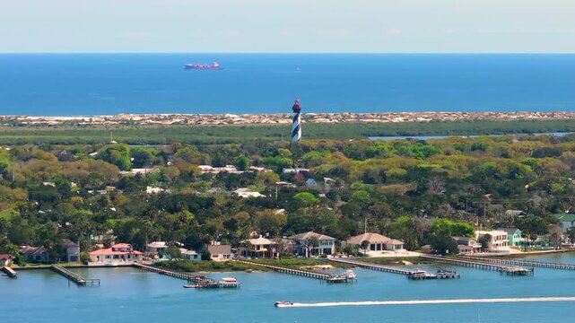 American national historic landmark in St. Augustine, Florida. Historical Lighthouse building on Atlantic ocean shore.