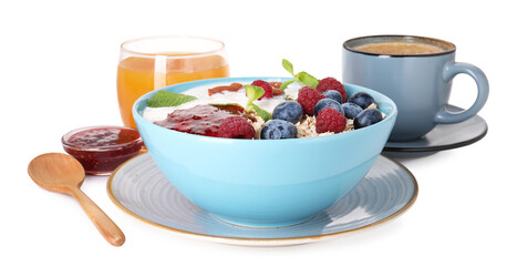 Healthy breakfast. Oatmeal with berries, yoghurt, jam, coffee and juice isolated on white