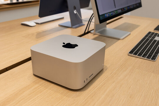 Apple Mac Studio professional workstation computer display at an Apple Store. Apple offers the Mac Studio for complex tasks.