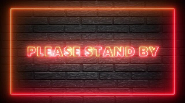 Please Stand By Orange Neon Sign Glowing on Dark Brick Wall