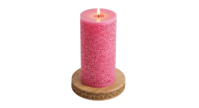 Pink floral candle isolated PNG on transparent background, decorative wax candle with carved flower pattern for home decor and relaxation