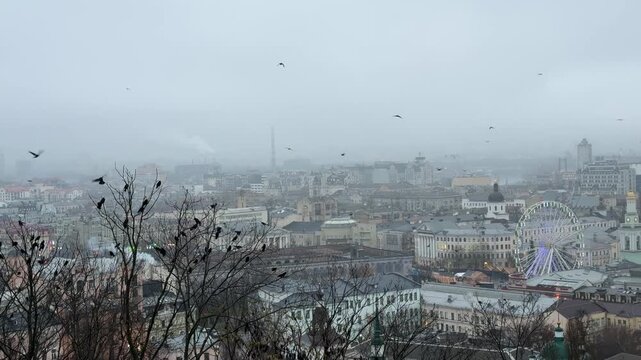 Ukraine Kyiv city Podol district in the cold foggy evening at winter.