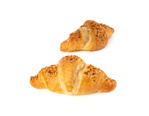 Delicious croissant with nut crumbs, sweet French bakery
