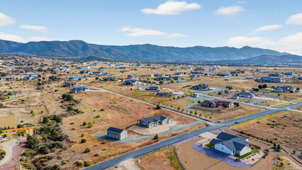 Community Growth Overview, Panoramic Shot Capturing Expanding Community With Open Spaces And Pathways
