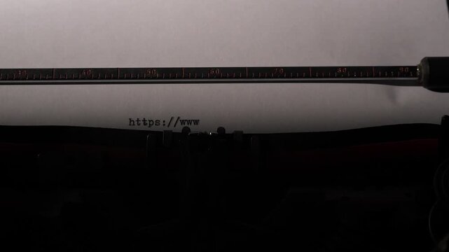 Vintage typewriter creating https,www. Mark on a blank sheet of paper, blending retro communication tools with modern digital connectivity and the concept of internet access