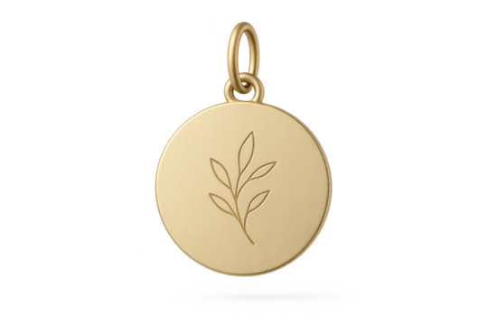 Gold round pendant with leaf design, isolated on transparent background.