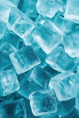 Pile of ice cubes on blue colored background suitable for mobile wallpaper design, refreshing cool atmosphere with clear frozen water crystals.