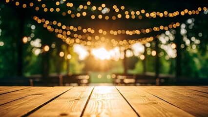 Warm string lights illuminate a romantic outdoor evening gathering with wooden table foreground