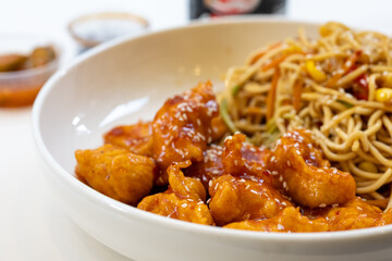 Close-Up of Honey Garlic Chicken with Korean Ramen
