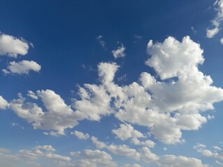scattered cumulus clouds at noon