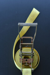 Ratchet mechanism with rolled cargo strap