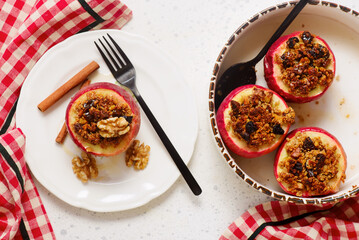 Baked apples with oatmeal, walnuts, raisins, honey and cinnamon