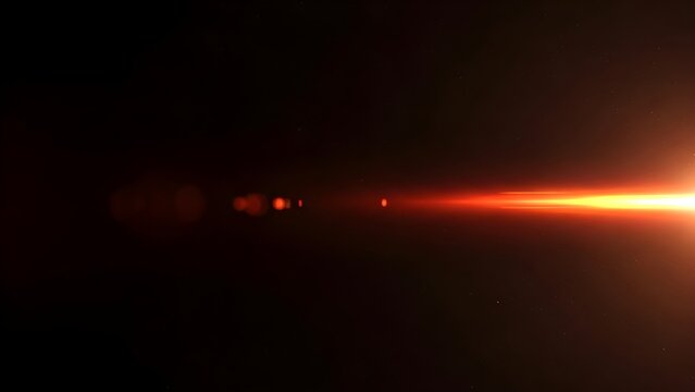 Bright orange lens flare overlay effect isolated on black background with light streaks - Powered by Adobe