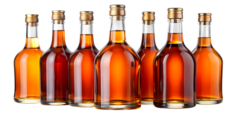 A row of six glass bottles filled with amber liquid and gold caps against a black background view on transparent background