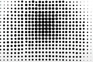 Black halftone pattern on white background creates gradient effect from varying circle sizes