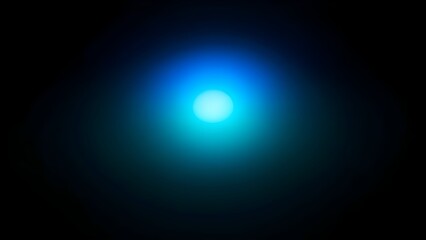 A vibrant blue circular light flare overlay, creating a soft glowing bokeh effect on a stark black background