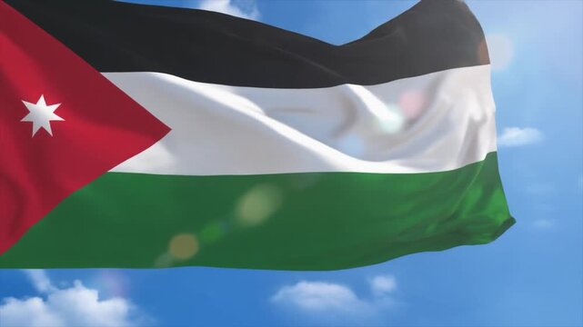 Jordanian Flag Rippling in the Wind Against a Bright Blue Sky waving