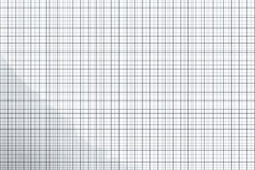 Graph paper with black lines creating square grid pattern on white background, showing slight paper crumpling