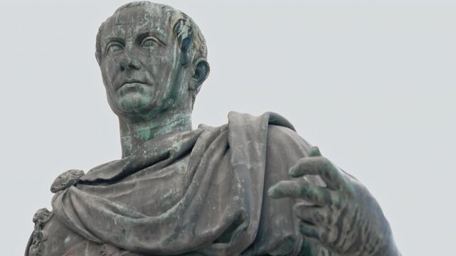 Statue of Julius Caesar Standing Proudly in Historic Center of Ancient City