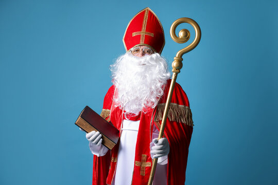 Saint Nicholas with book and crozier on blue background - Powered by Adobe