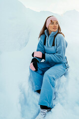 Beautiful caucasian women posing in winter sports clothing during sunset in Lapland