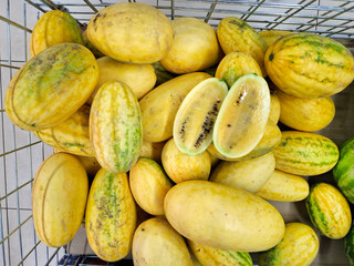 Yellow watermelon. Hybrid of watermelon and melon