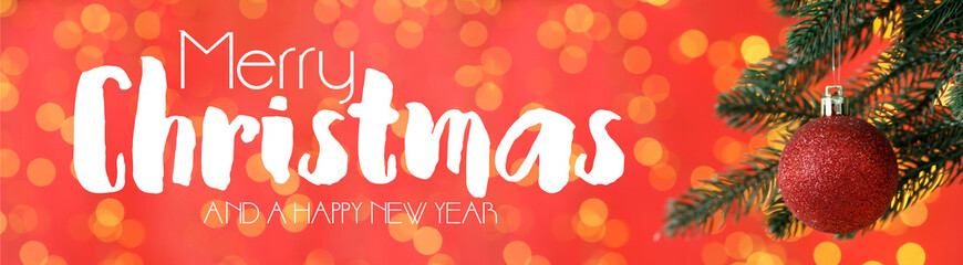Merry Christmas and Happy New Year. Greeting card with fir tree, festive ornament and bokeh lights on red background