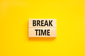 Break time symbol. Concept word Break time on beautiful wooden blocks. Beautiful yellow paper background. Business break time concept. Copy space.