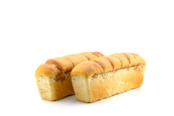 two loaves of freshly baked rectangular bread on a white background