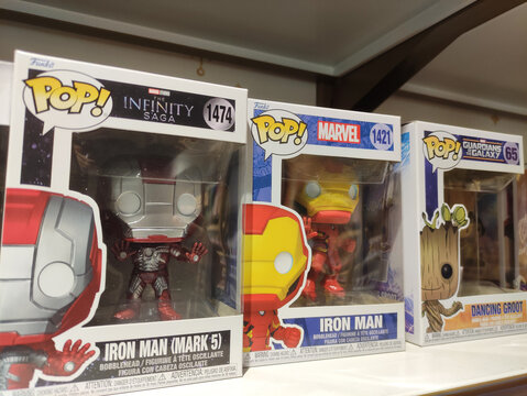 Rome, Italy - November 29, 2025: Iron Man Mark 5 and Marvel characters displayed in collectible boxes on a shelf, showcasing vibrant colors and detailed designs in a playful atmosphere