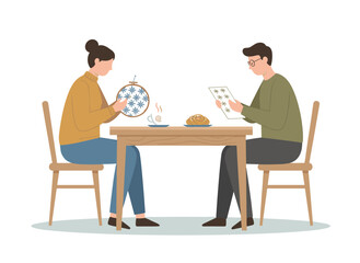 Female friends chat while seated at a snug home table, engaging in knitting, drawing, and conversation during leisure time, depicted as a flat vector illustration on a white background
